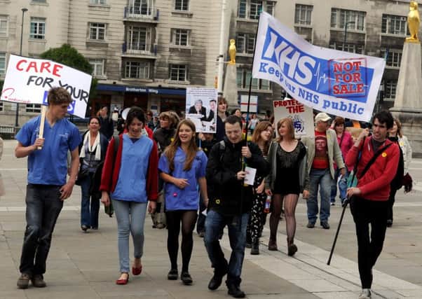 Keep Our NHS Public campaigners on a previous march through Leeds. Picture by James Hardisty.