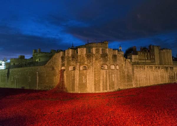 The 'Blood Swept Lands and Seas of Red' poppy installation at the Tower of London.  Pic: Sebastian Remme/REX.