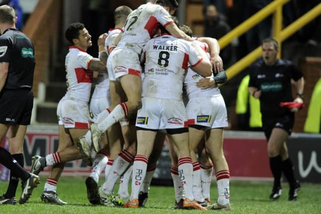 Hull KR celebrate Mitch Allgood's try against 
Leeds Rhinos. Picture: Bruce Rollinson.