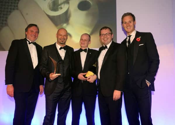 The Yorkshire Post Excellence in Business Awards 2013, which were held at The Queens Hotel, Leeds.  Companies with a Turnover up to Â£10M award winners Evenort. From the left, Richard Gregory of Yorkshire Bank , Darren Roberts, Peter Sarginson and Craig McKay of Evenort, with host Dan Walker.