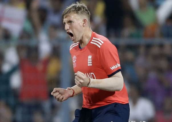 Yorkshire's Joe Root celebrates after taking the wicket of the West Indies' Chris Gayle during Sunday's World Twenty20 final (Picture: Saurabh Das/AP).