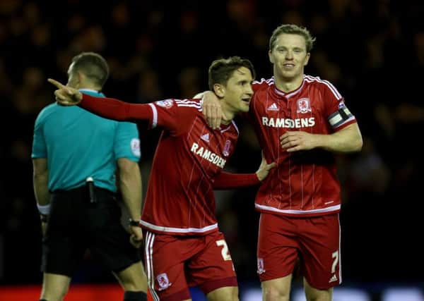 Middlesbrough's Gaston Ramirez (left) celebrates scoring his side's third goal of the game with team-mate Grant Leadbitter.