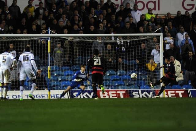 Leeds 
United's Bailey Peacock-Farrell can't stop Tjaronn Chery's penalty.

 Picture: Jonathan Gawthorpe