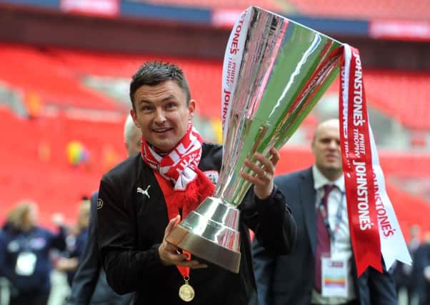 Barnsley manager Paul Heckingbottom with JPT trophy at Wembley. (Picture: Tony Johnson)