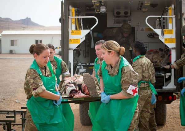 Military staff at the 34 Field Hospital from North Yorkshire demonstrate an exercise on how they would deal with casualties in the field. Picture:SWNS