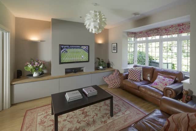 The existing sitting room has been modernised