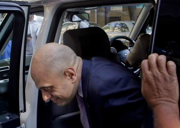 Business Secretary Sajid Javid arrives for a meeting with Tata chairman Cyrus Mistry at the Bombay House, the Tata group's headquarters, in Mumbai, India.