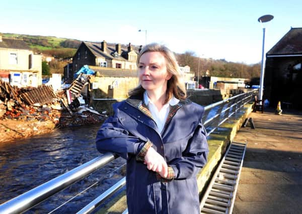 Environment Secretary Elizabeth Truss during a vist to flood-hit Mytholmroyd.