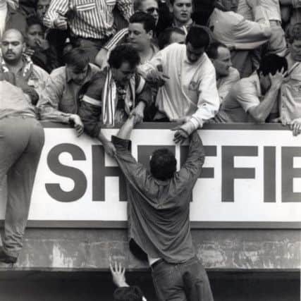 Paul Walmsley at Hillsborough stood with his friend John Barlow in the stand just after being pulled up.