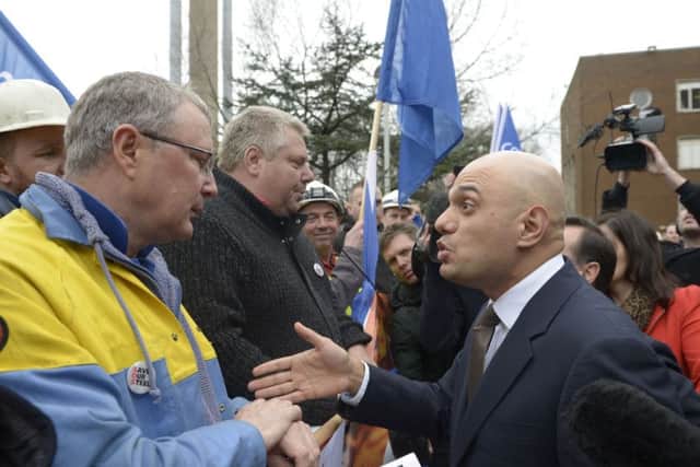 Business Secretary Sajid Javid talks to workers as he leaves
Tata Steel in Port Talbot, South Wales, as the Government outlined its response to the crisis gripping the steel industry. PRESS ASSOCIATION Photo. Picture date: Friday April 1, 2016. Javid met managers and staff after having to cut short a business trip to Australia to deal with the aftermath of Tata Steel's shock decision to sell its loss-making UK assets. See PA story INDUSTRY Steel. Photo credit should read: Ben Birchall/PA Wire