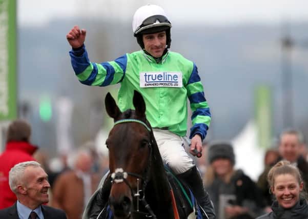 Jockey Brian Hughes celebrates on board Ballyalton after victory in the Close Brothers Novices' Handicap Chase at Cheltenham last month. Picture: PA.