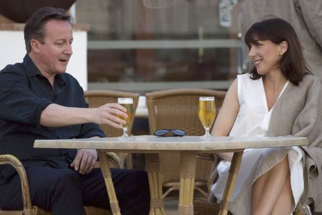 Prime Minister David Cameron and his wife Samantha pose for a photograph during their holiday in Playa Blanca, Lanzarote. PRESS ASSOCIATION Photo. Picture date: Friday March 25, 2016. Photo credit should read: Neil Hall/PA Wire
