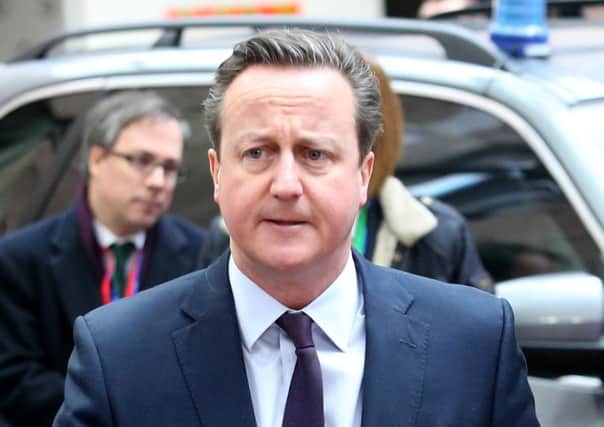 British Prime Minister David Cameron arrives for an EU summit at the EU Council building in Brussels on Monday, March 7, 2016. European Union leaders arrived in Brussels Monday to press Turkey to do more to stop migrants entering Europe and to shore up support for Greece, where thousands of people are stranded. (AP Photo/Francois Walschaerts)