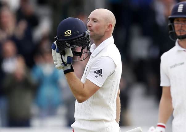 Crowning moment: Yorkshires Whitby-born batsman Adam Lyth celebrates his maiden century for England during day two of the second Test against New Zealand at Headingley in May last year. (Picture: Lynne Cameron/PA)