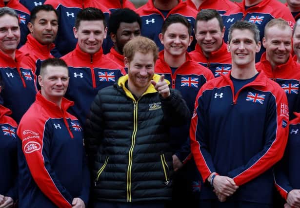 Prince Harry (centre) at Buckingham Palace in London at the unveiling of the UK team for the Invictus games 2016.