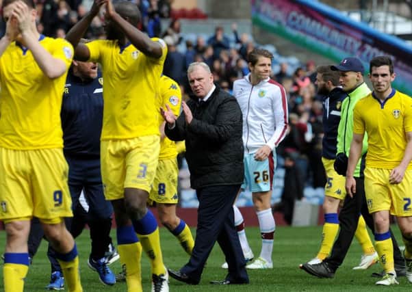 Leeds head coach Steve Evans and his players thank the travelling fans. Picture : Jonathan Gawthorpe