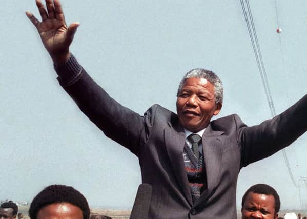 Nelson Mandela's example is used to highlight difficulties with the rewriting of history.