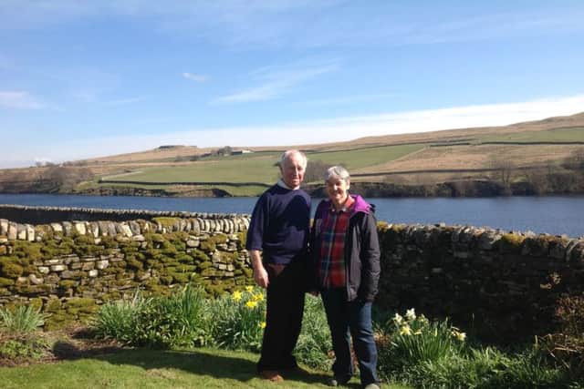 Robin and Ann Dant in the garden with sensational views