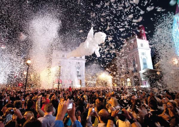 The UK premiere of Place des Anges, featuring aerial artists performing on zip wires over Piccadilly Circus.