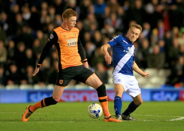 Hull City's Sam Clucas, in action against Birmingham City, is ready to start against Wolves at the KC Stadium tonight (Picture: PA).