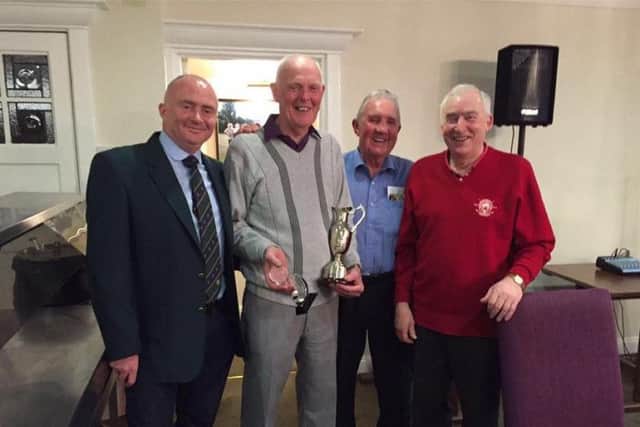 Branshaw GC's Brian Wilson receives the Andrew Oakes Memorial Trophy.