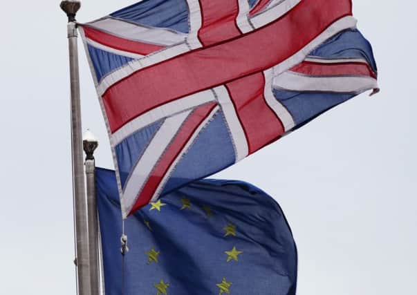 File photo dated 01/03/16 of the Union Jack  pictured next to the European Union flag, as Leave campaigners have accused the Government of trying to "bury" its own report into Britain's obligations to the EU. PRESS ASSOCIATION Photo. Issue date: Friday April 15, 2016. The Vote Leave campaign group claimed ministers were too embarrassed by the contents of the Rights And Obligations Of European Union Membership document to highlight it. See PA story POLITICS EU Leave. Photo credit should read: Yui Mok/PA Wire