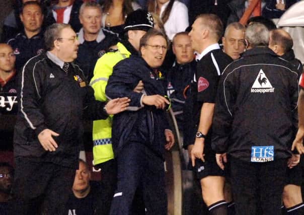 Sheffield United chief 
Neil Warnock is sent to the stand against Leeds in April, 2006