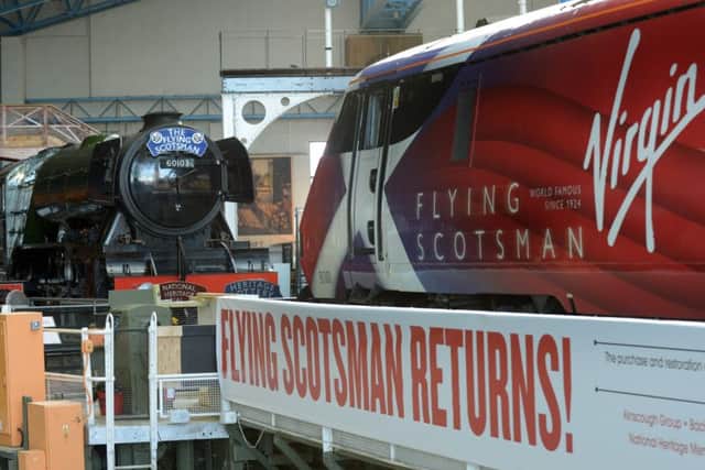 The Flying Scotsman and the newly named Virgin East Coast train Flying Scotsman nose to nose  at the National Railway Museum in York in March.
