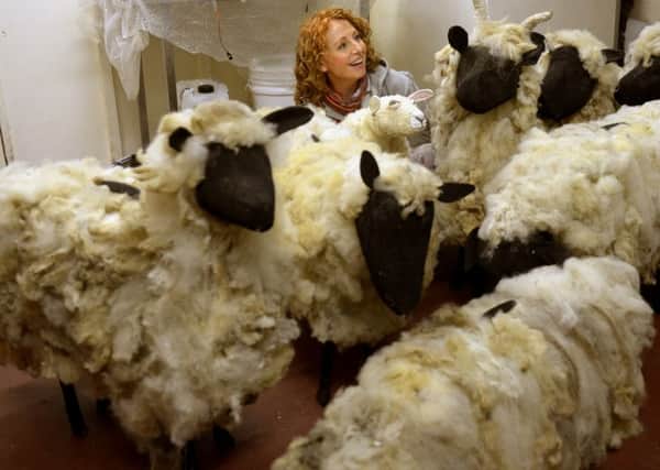 Volunteer Joanna Jefferies with some of the sheep being made at St Williams College  for Noah's Ark in the York Mystery Plays