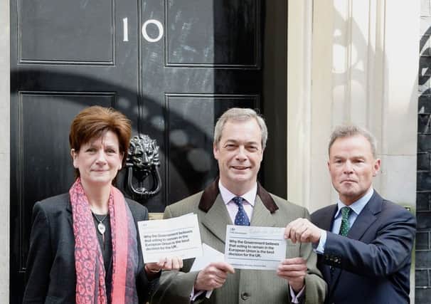 UKIP MEP Diane James, UKIP leader Nigel Farage and UKIP London Mayoral Candidate Peter Whittle hand over a letter on the Government using tax payers' money to produce a pro-EU leaflet, at Downing Street.