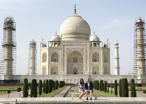 The Duke and Duchess of Cambridge in front of the Taj Mahal in India during day seven of the Royal tour to India and Bhutan.