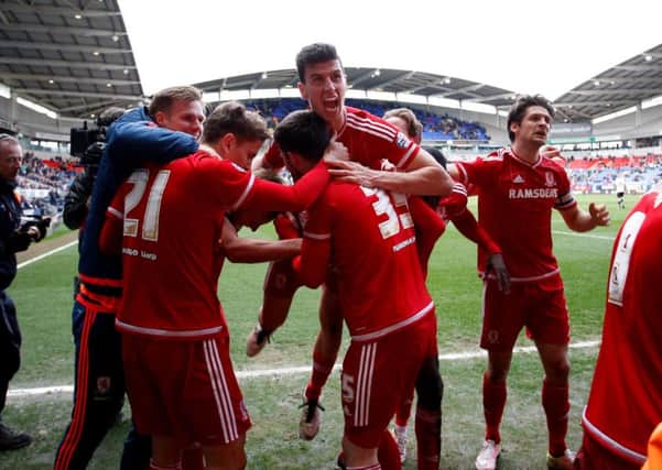 Middlesbrough's Daniel Ayala celebrates with team after his team score thei second goal.
