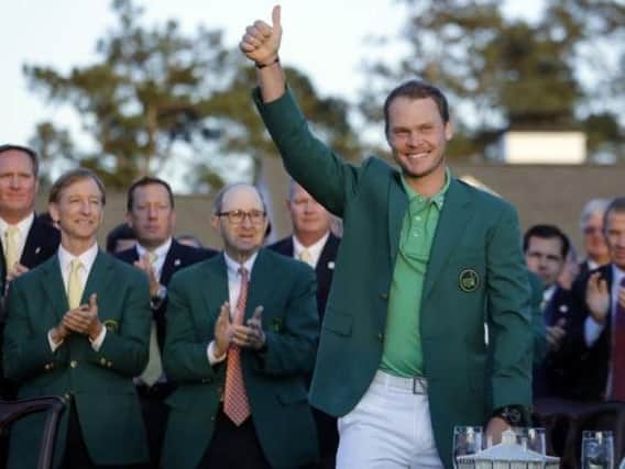 Danny Willett takes the crowd's applause at Augusta (Picture: Jae C Hong/AP).