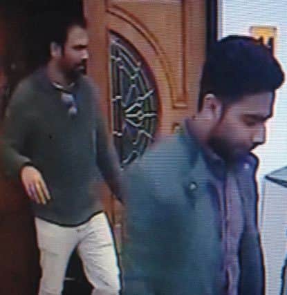 Police CCTV of two men who enquired about seaside accommodation