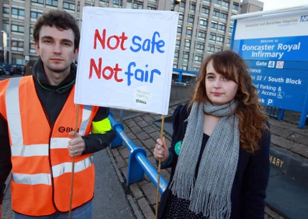 Junior doctors on strike at Doncaster Royal Infirmary earlier in the dispute. Pictured are Rob Lewis and Hayley Evans.