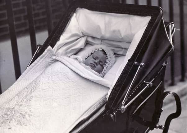 Princess Elizabeth (later Queen Elizabeth II) in her pram, taken when she was under six months old.