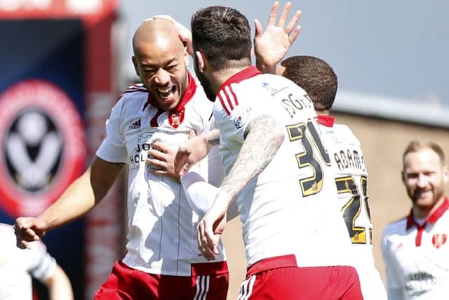 Alex Baptiste, celebrating scoring for Sheffield United in the League One match against Chesterfield