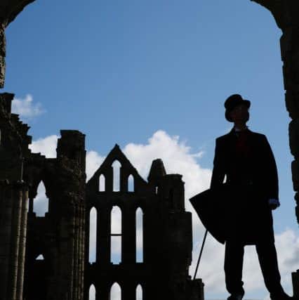 A man visits Whitby Abbey during the 2016 April Goth Weekend.  April 23 2016. Picture: Ceri Oakes w161750a