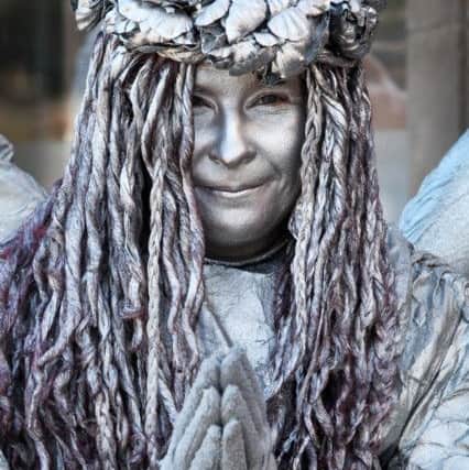 A silver woman attended the Whitby Goth Weekend. April 23 2016. Picture: Ceri Oakes w161750g