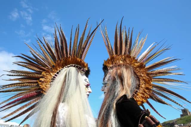 Joanna Martyn and Kate Wright from Hull show of their amazing feather head-dresses at the April Whitby Goth Weekend.