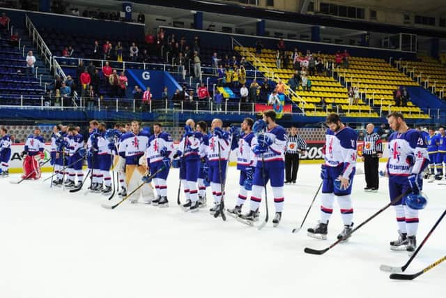 GB's players show their disappointment at the post-match presentatyion ceremony. Picture: Colin Lawson.