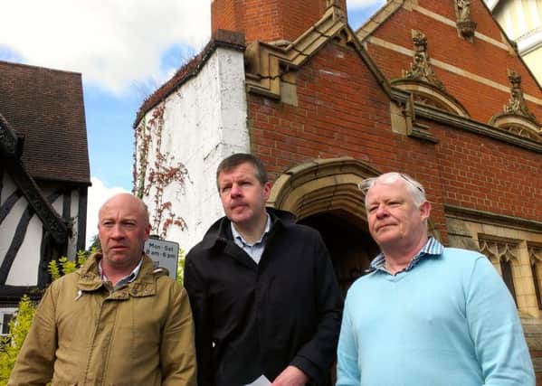 St William's victims Darren Furness and Nigel Feeley, with their solicitor David Greenwood (centre) outside St John's Church, Beverley