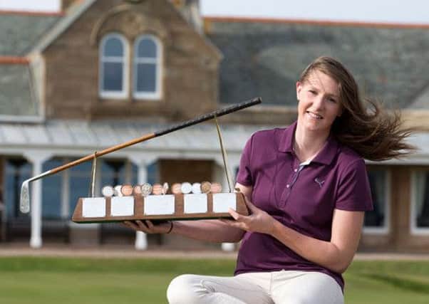 Rotherham GC's Olivia Winning with the Helen Holm trophy (Picture: Kenny Smith/Scottish Golf).