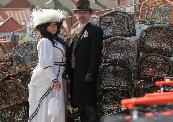 Mandy Benton and Phil Johnson amongst the lobster pots during Goth Weekend.