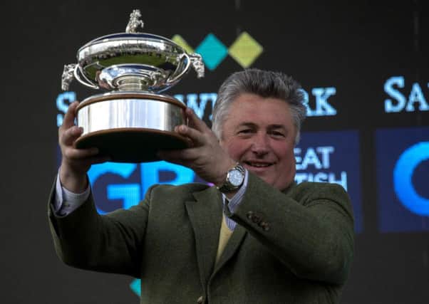 Paul Nicholls with the Champion National Hunt trainers' trophy