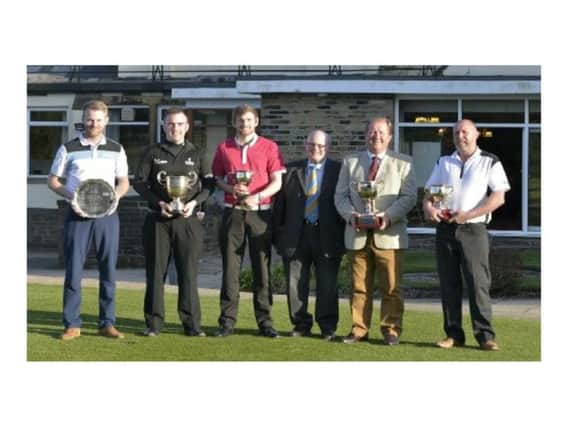 L-r: Reece Jennison with Page Trophy, Gareth Evans with Colin Swain Trophy, James Ward with Professionals Cup, Barry Isles, Mike Holroyde with Roger Heap Cup, and Nick Day with Club Championship Cup.