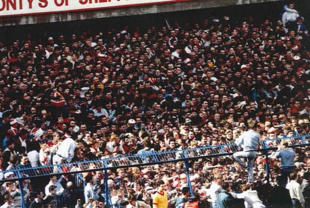 Overcrowding at Hillsborough, where 96 football fans died.