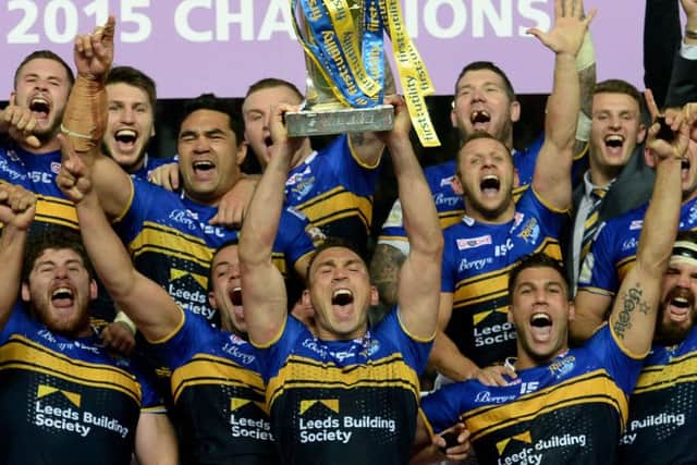 Leeds Rhinos captain Kevin Sinfield lifts the trophy after winning the Super League Grand Final at Old Trafford last year - sealing the treble for his team.
