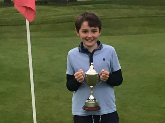 Matthew Wharldall with Rudding Park GC's Spring Cup.