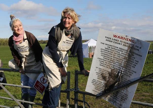 Actresses Emma Thompson (right) and her sister Sophie at a potential fracking site near Preston, where they have broken a court injunction to film a pastiche episode of the Great British Bake Off